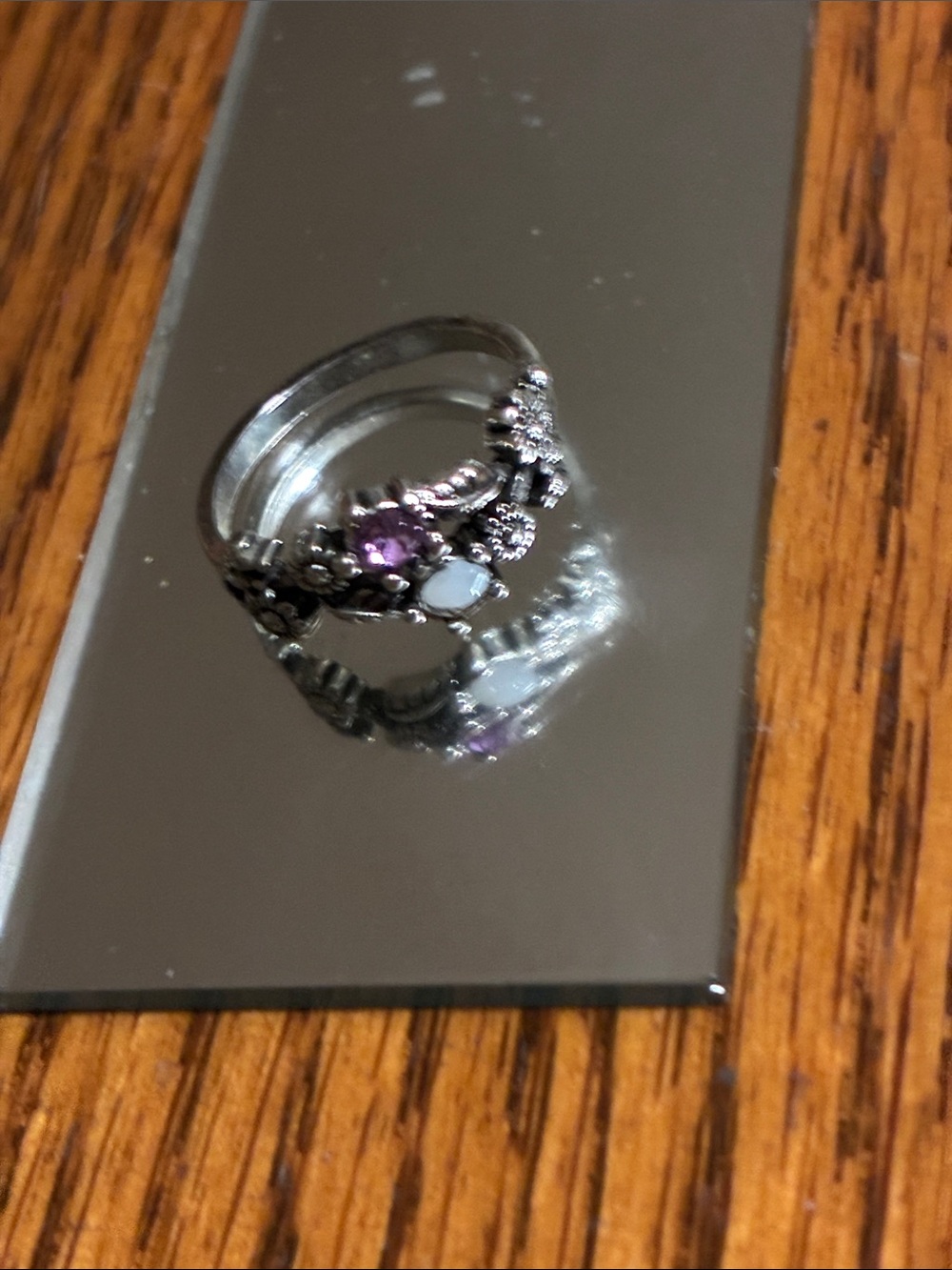 Silver Floral Ring with Purple Accent Stone